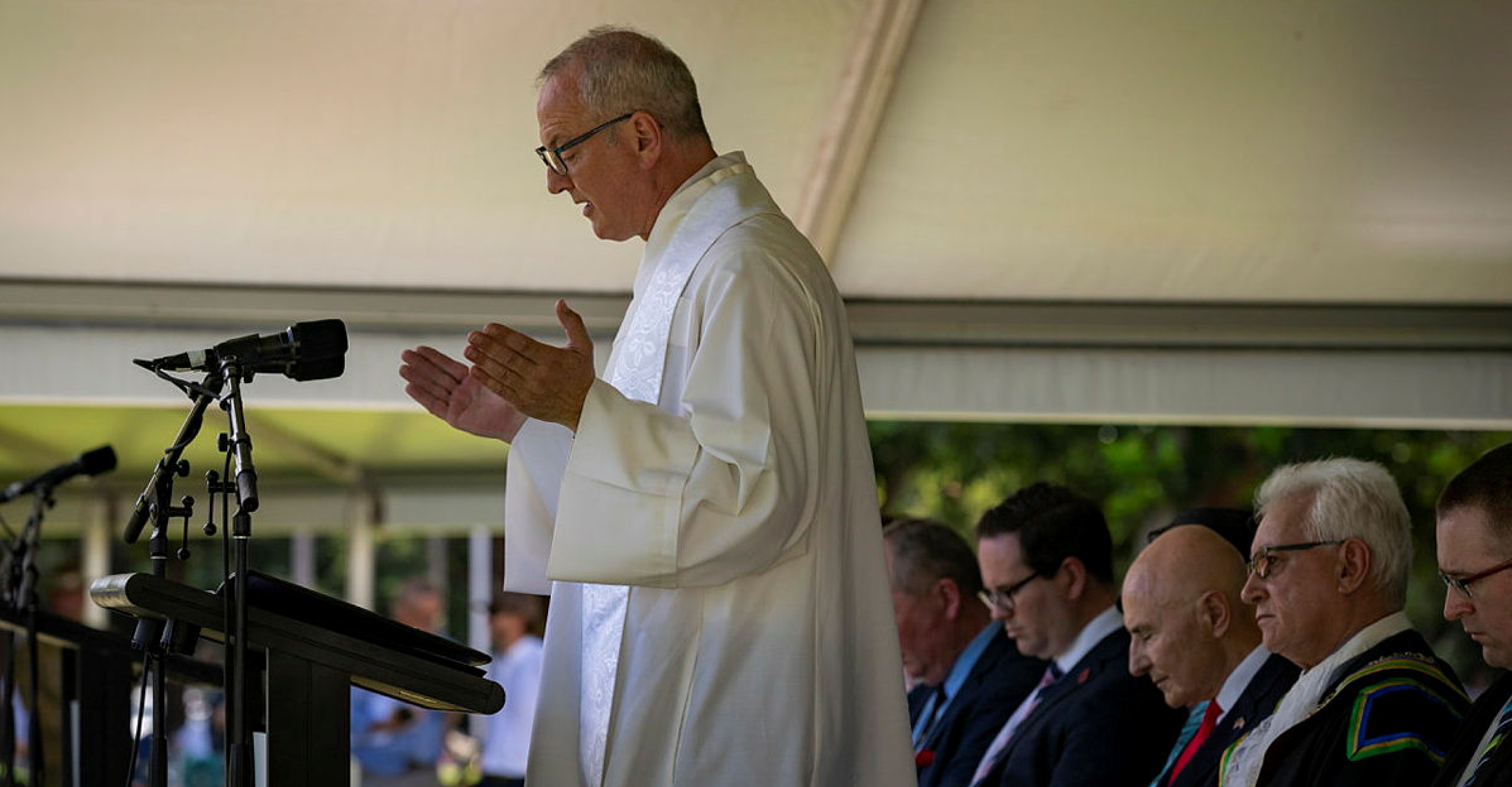 Australian Army Chaplain Brendan Quirk leads a prayer during the Bombing of Darwin commemoration service in Darwin, NT