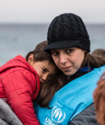 refugees being saved from the water