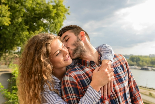 couple hugging outdoors
