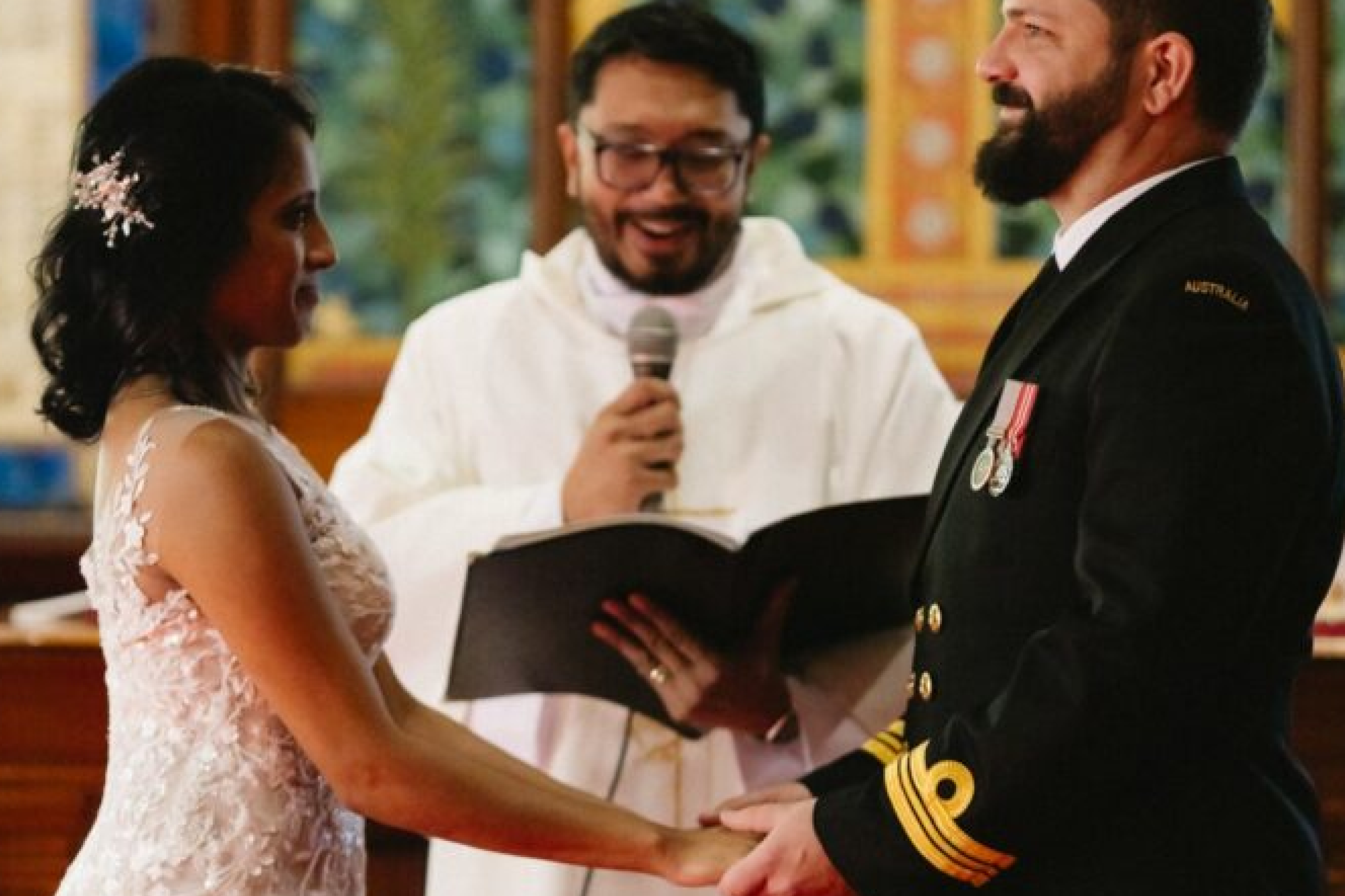 Adrian Gomez officiating a wedding at HMAS Kuttabul