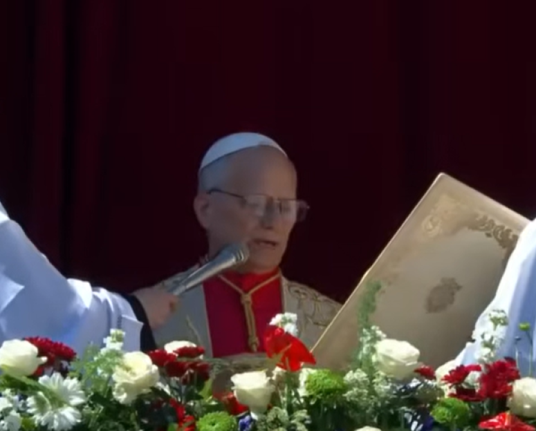 Pope Leo praying for peace during mass on Sunday from his balcony at the Vatican